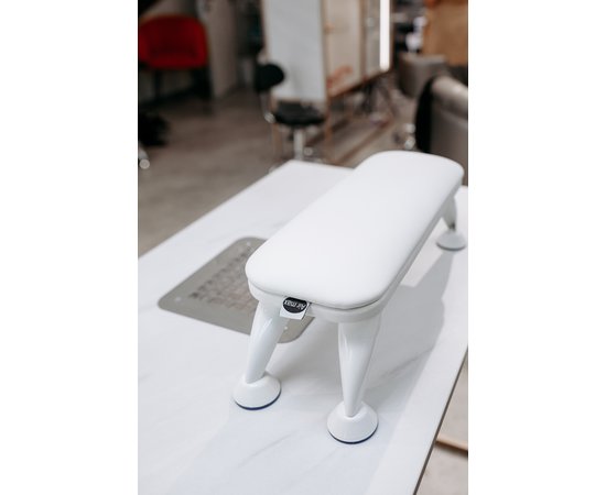 Изображение  Manicure palm rest on white legs Air Max white